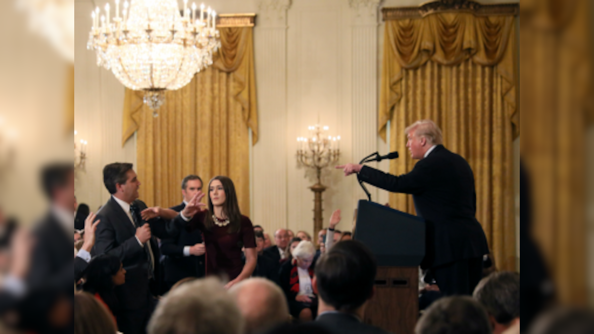 White House restores full press credentials of CNN reporter Jim Acosta; news channel withdraws lawsuit